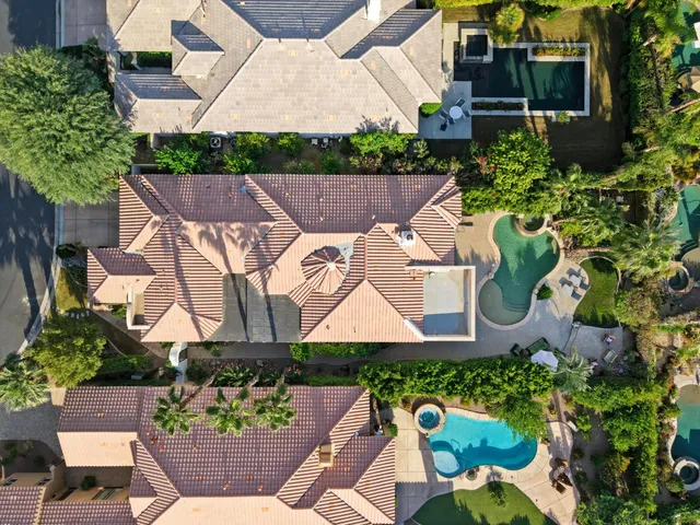 a sign that is in front of flowers