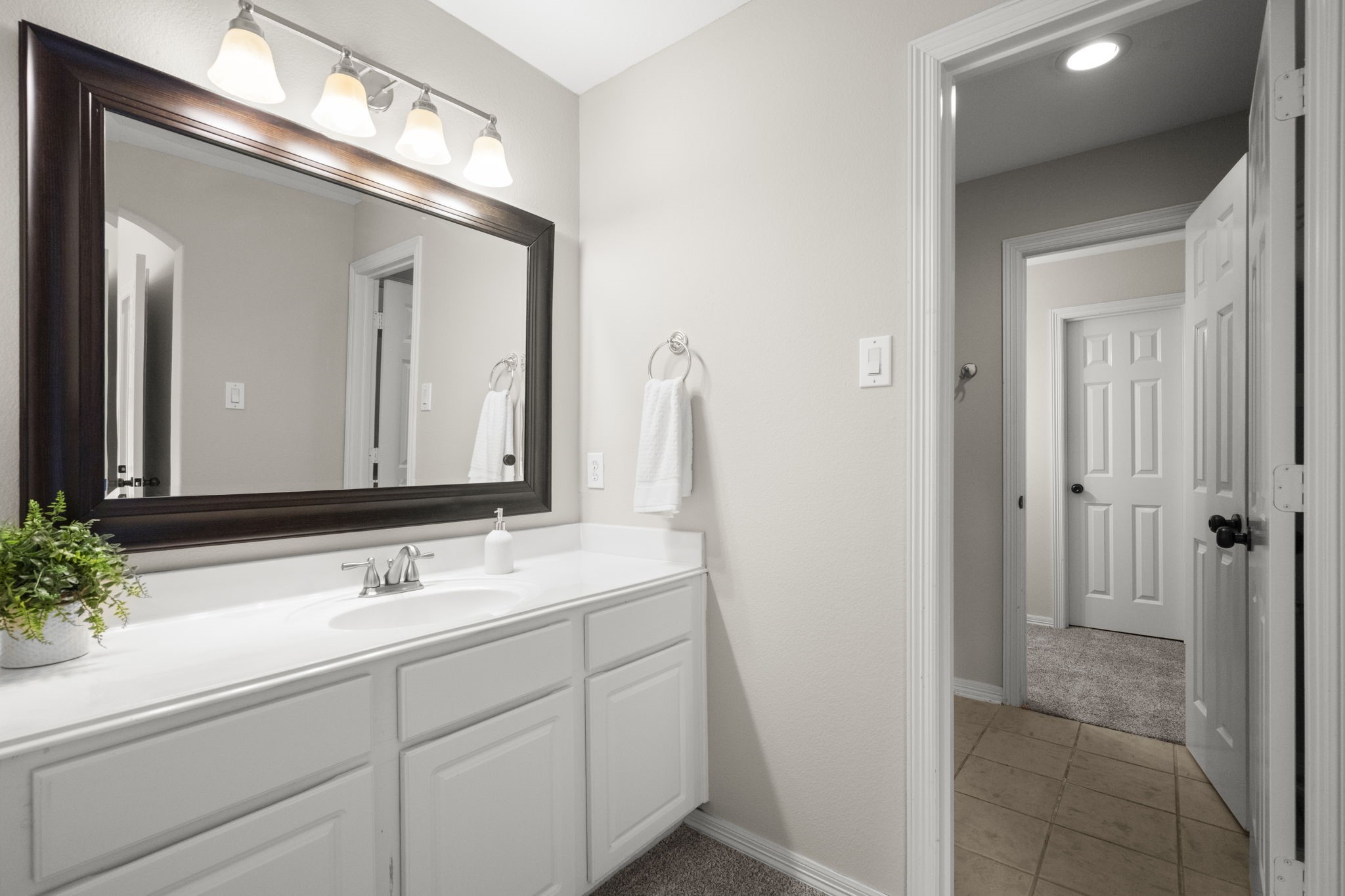2326 Timbergreen Circle Magnolia, TX 77355 - Photo 32 of 43 a bathroom with a sink and a mirror