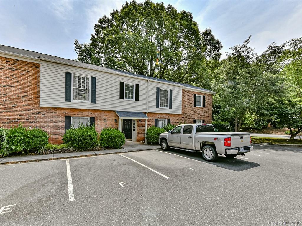 5925 Quail Hollow Road, Unit G Charlotte, NC 28210 - Photo 1 of 19 a car parked in front of a house