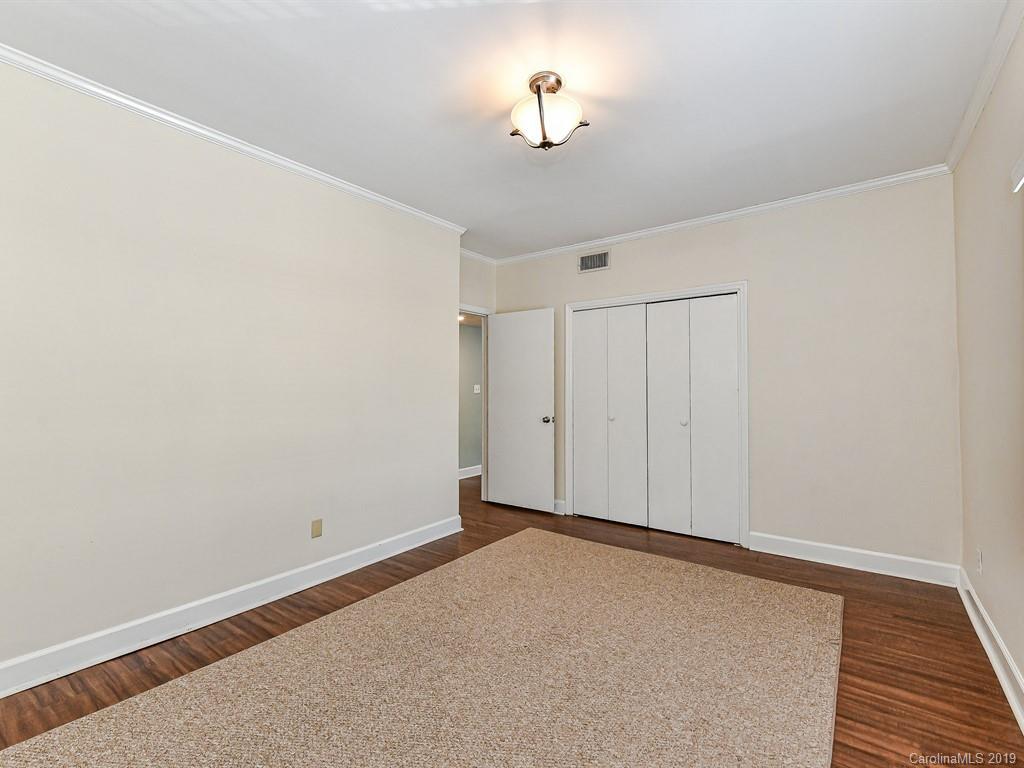 5925 Quail Hollow Road, Unit G Charlotte, NC 28210 - Photo 17 of 19 a view of an empty room