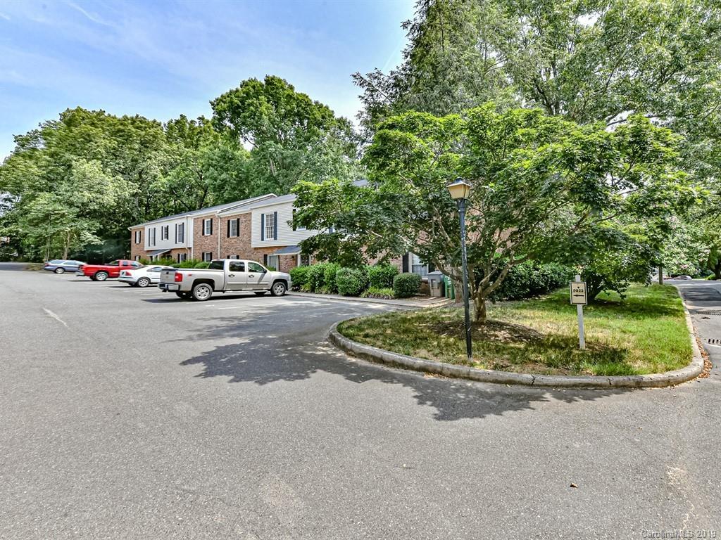 5925 Quail Hollow Road, Unit G Charlotte, NC 28210 - Photo 19 of 19 a cars parked on the side of the road