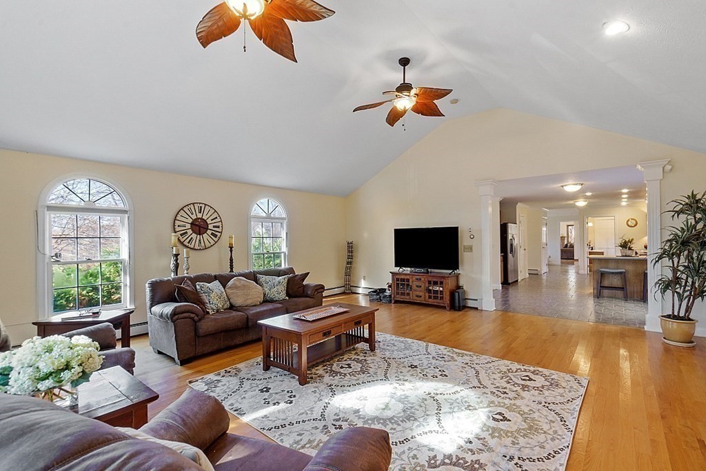 169 Wallace Hill Road Townsend, MA 01469 - Photo 11 of 42 a living room with furniture and a flat screen tv