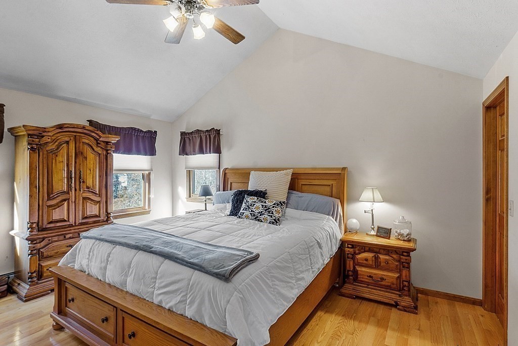 169 Wallace Hill Road Townsend, MA 01469 - Photo 14 of 42 a bedroom with a bed and window