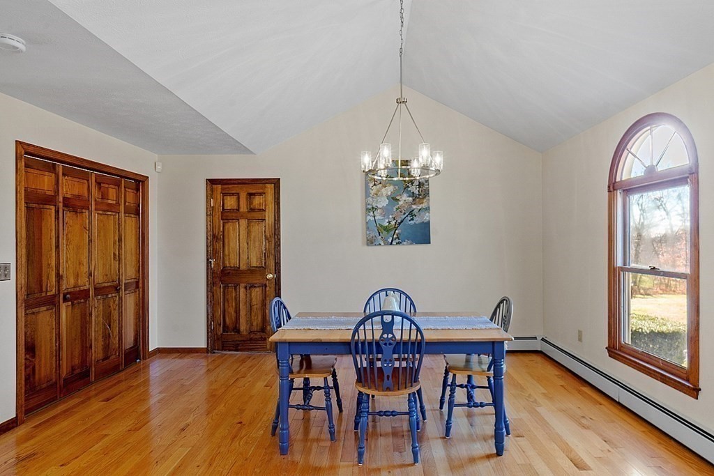 169 Wallace Hill Road Townsend, MA 01469 - Photo 23 of 42 a view of a dining room with furniture window and wooden floor