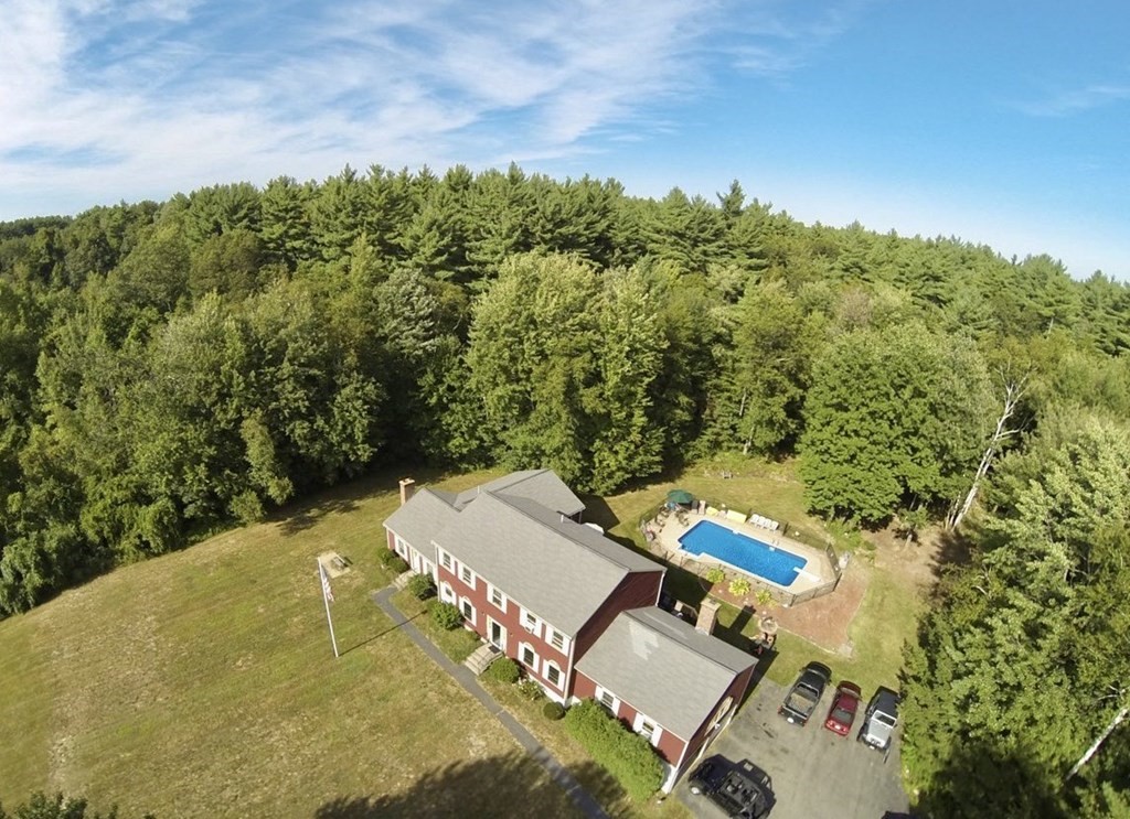 169 Wallace Hill Road Townsend, MA 01469 - Photo 37 of 42 an aerial view of a house with a yard