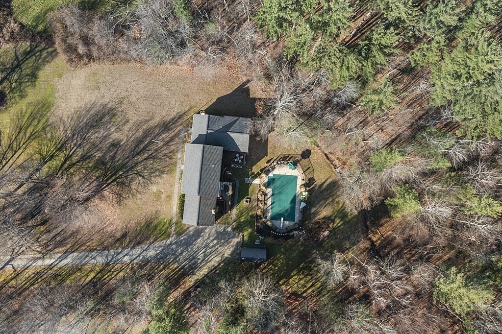 169 Wallace Hill Road Townsend, MA 01469 - Photo 39 of 42 a view of a house with a yard