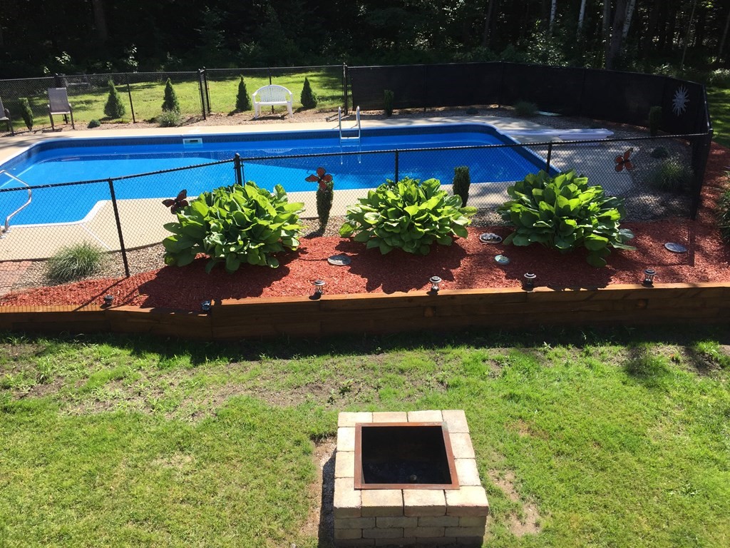 169 Wallace Hill Road Townsend, MA 01469 - Photo 40 of 42 a view of a yard with a patio