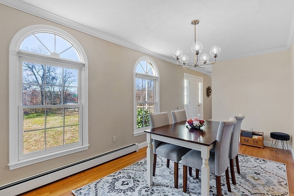 169 Wallace Hill Road Townsend, MA 01469 - Photo 4 of 42 a view of a dining room with furniture window and wooden floor