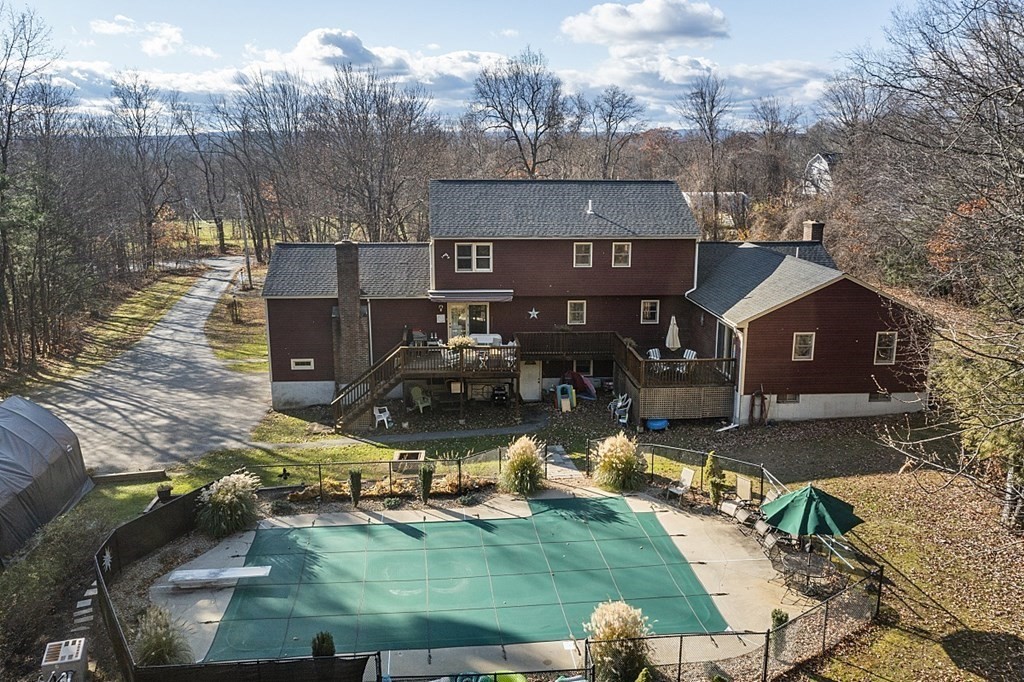 169 Wallace Hill Road Townsend, MA 01469 - Photo 42 of 42 a view of a house with swimming pool