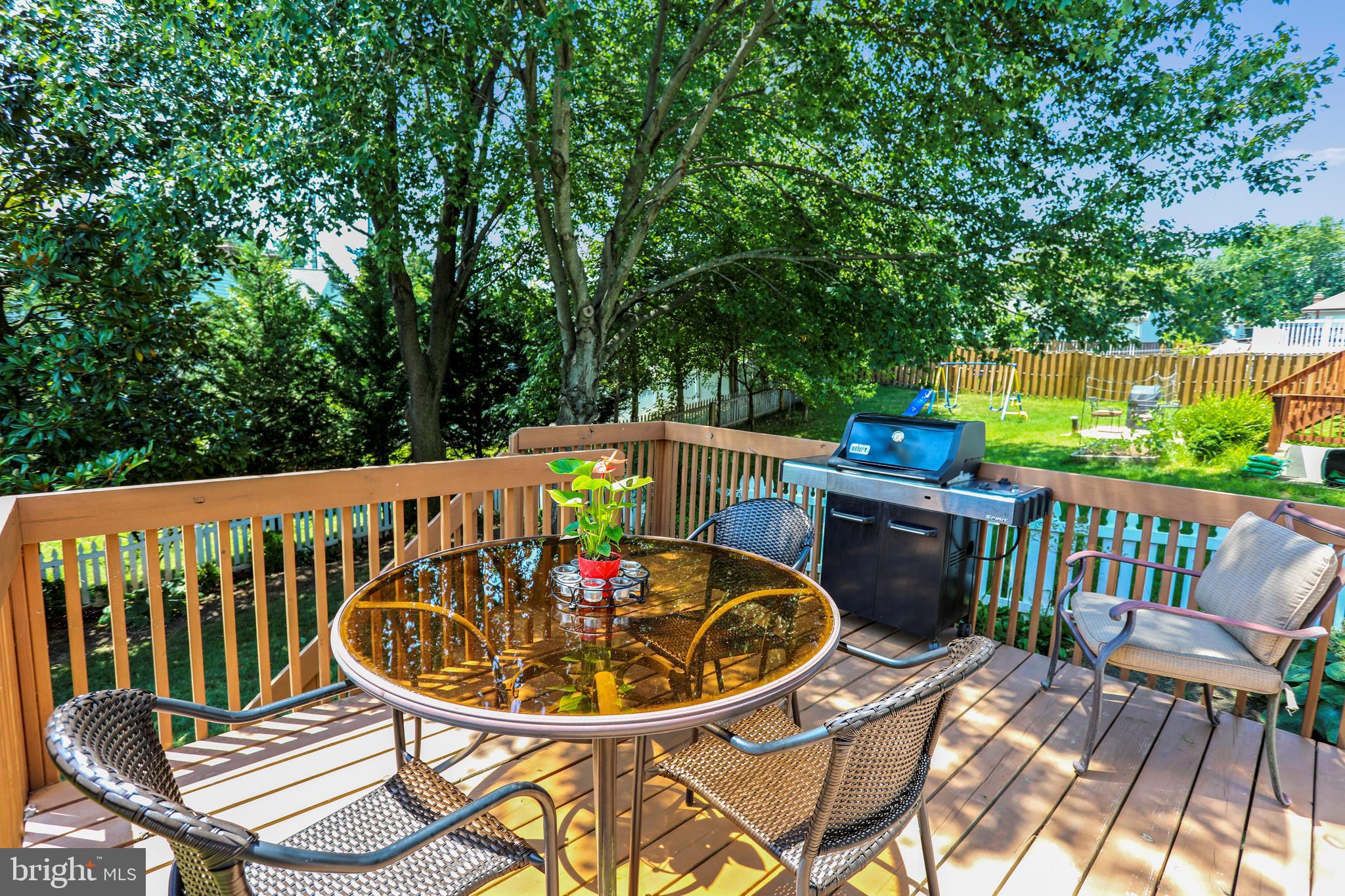 13924 Riding Loop Drive North Potomac, MD 20878 - Photo 17 of 45 Wonderful deck overlooking the rear yard