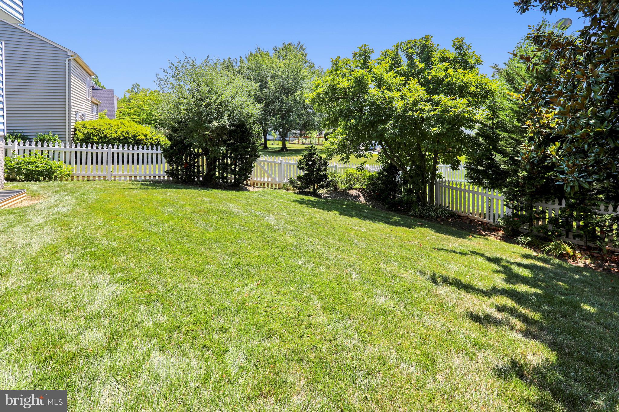 13924 Riding Loop Drive North Potomac, MD 20878 - Photo 44 of 45 Fabulous rear yard with white picket fence