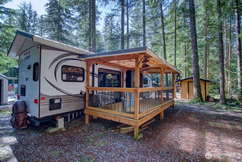 64 Wilderness Way Deming, WA 98244 - Photo 8 of 33 a view of a house with a yard