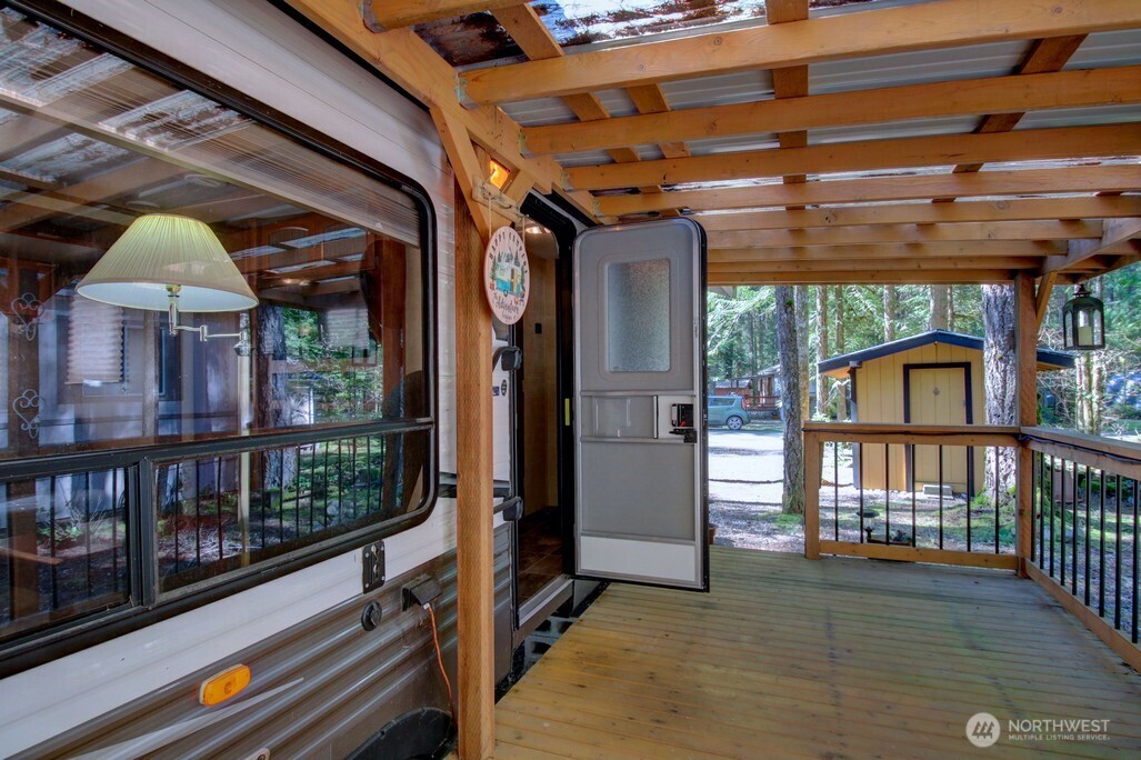 64 Wilderness Way Deming, WA 98244 - Photo 9 of 33 a view of porch with a bench