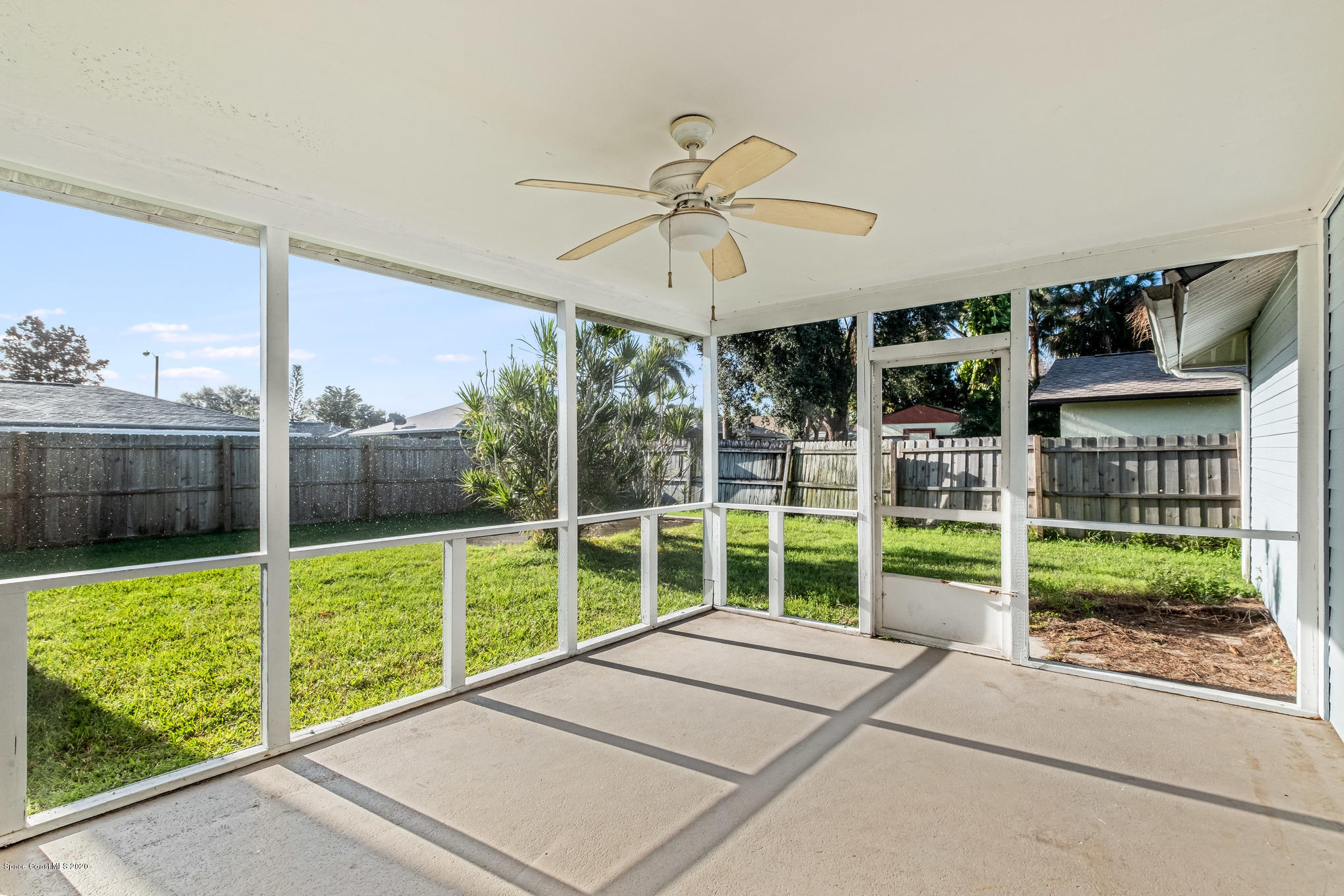 857 Levitt Parkway Rockledge, FL 32955 - Photo 11 of 12 Screened Porch