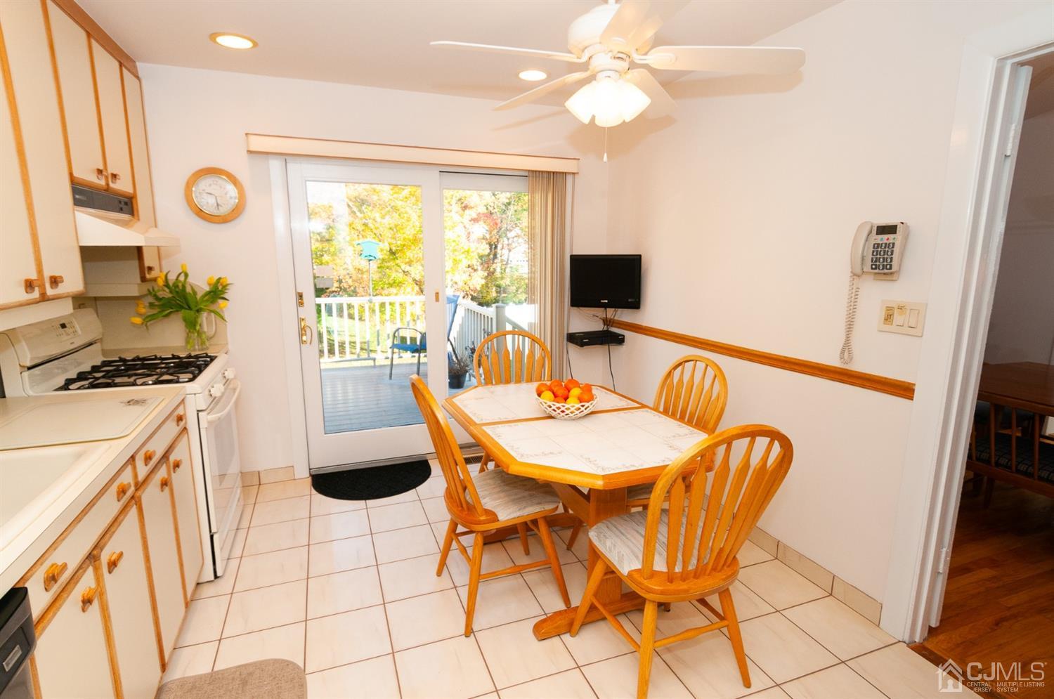 82 Harmon Road Edison, NJ 08837 - Photo 15 of 47 a view of a dining room with furniture window and outside view
