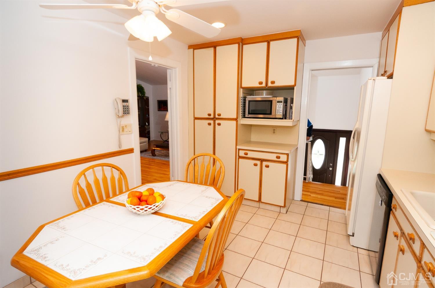 82 Harmon Road Edison, NJ 08837 - Photo 17 of 47 a view of a kitchen that has a microwave and a sink