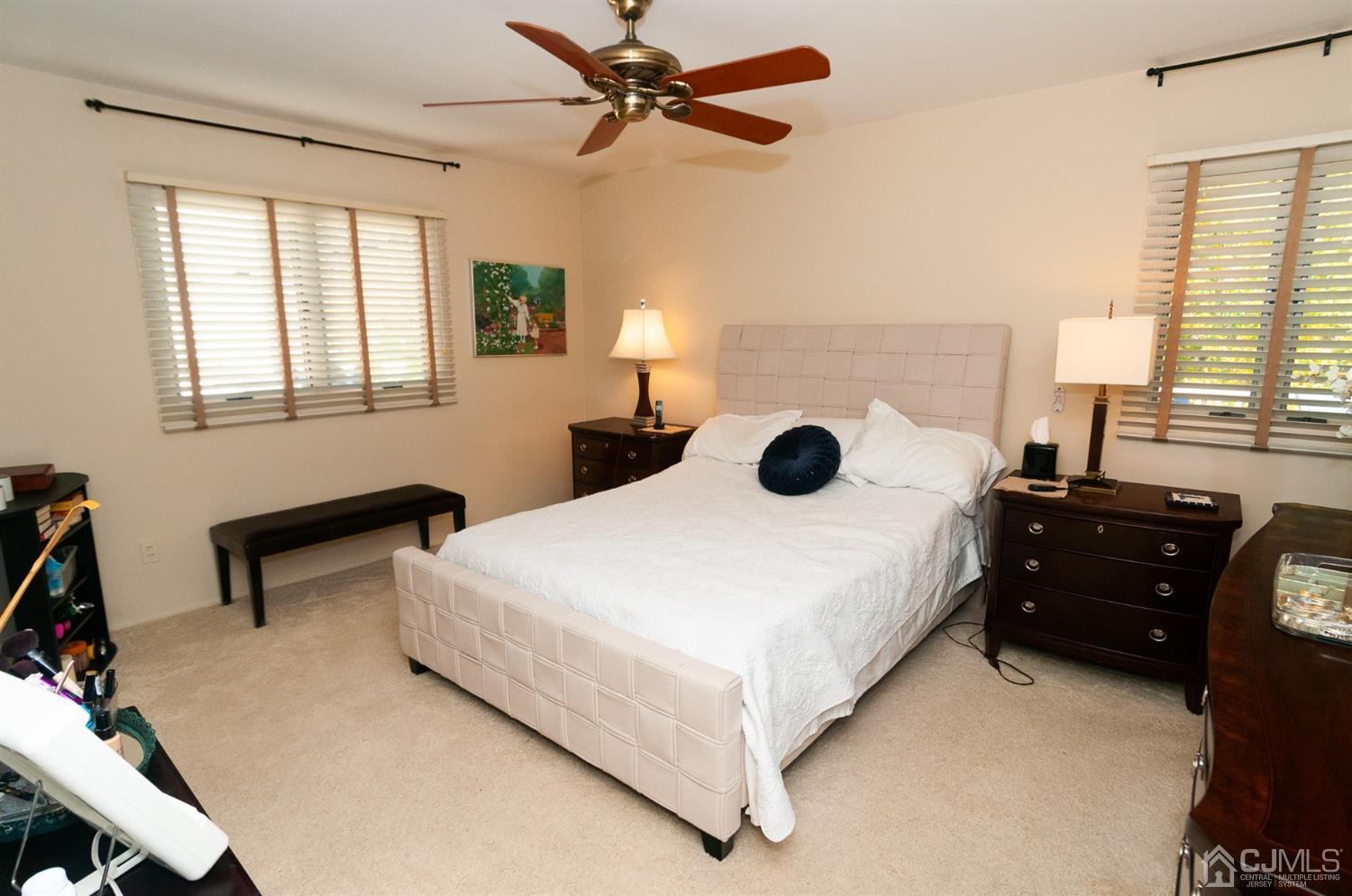 82 Harmon Road Edison, NJ 08837 - Photo 21 of 47 a bedroom with a bed and a chandelier