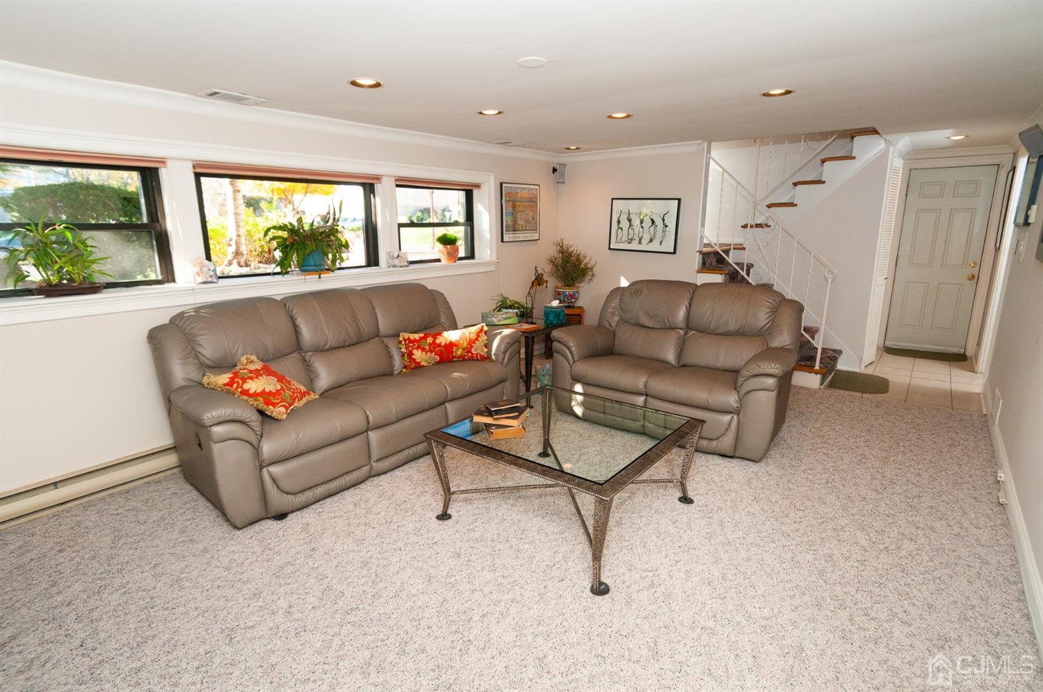 82 Harmon Road Edison, NJ 08837 - Photo 32 of 47 a living room with furniture and a large window