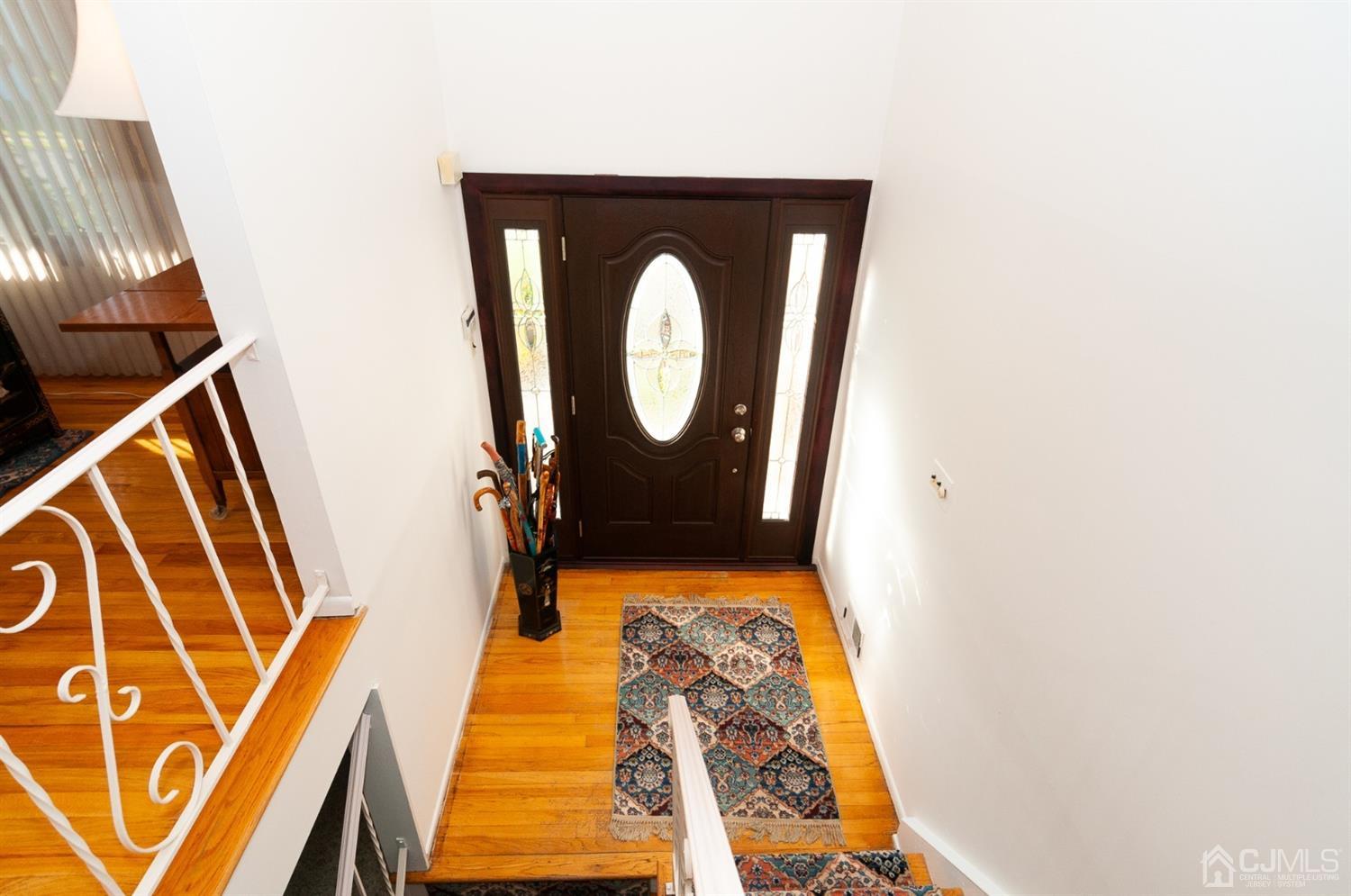 82 Harmon Road Edison, NJ 08837 - Photo 5 of 47 a front view of a house with a door