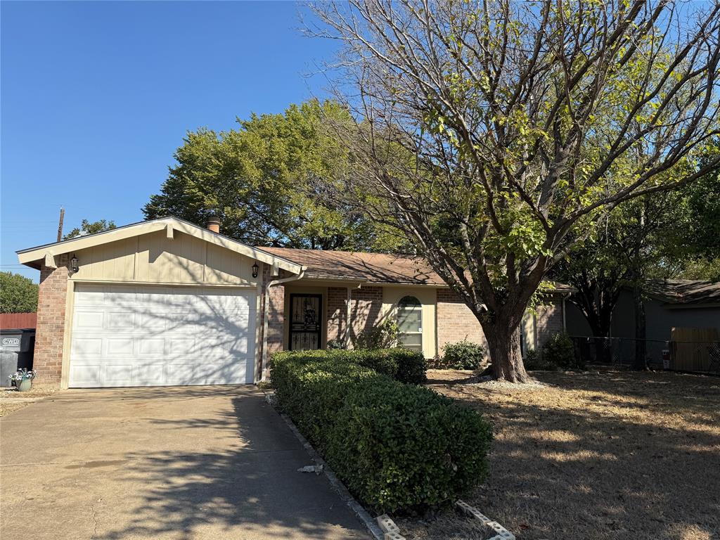 1535 Clearbrook Street Lancaster, TX 75134 - Photo 15 of 15 a front view of a house with garden