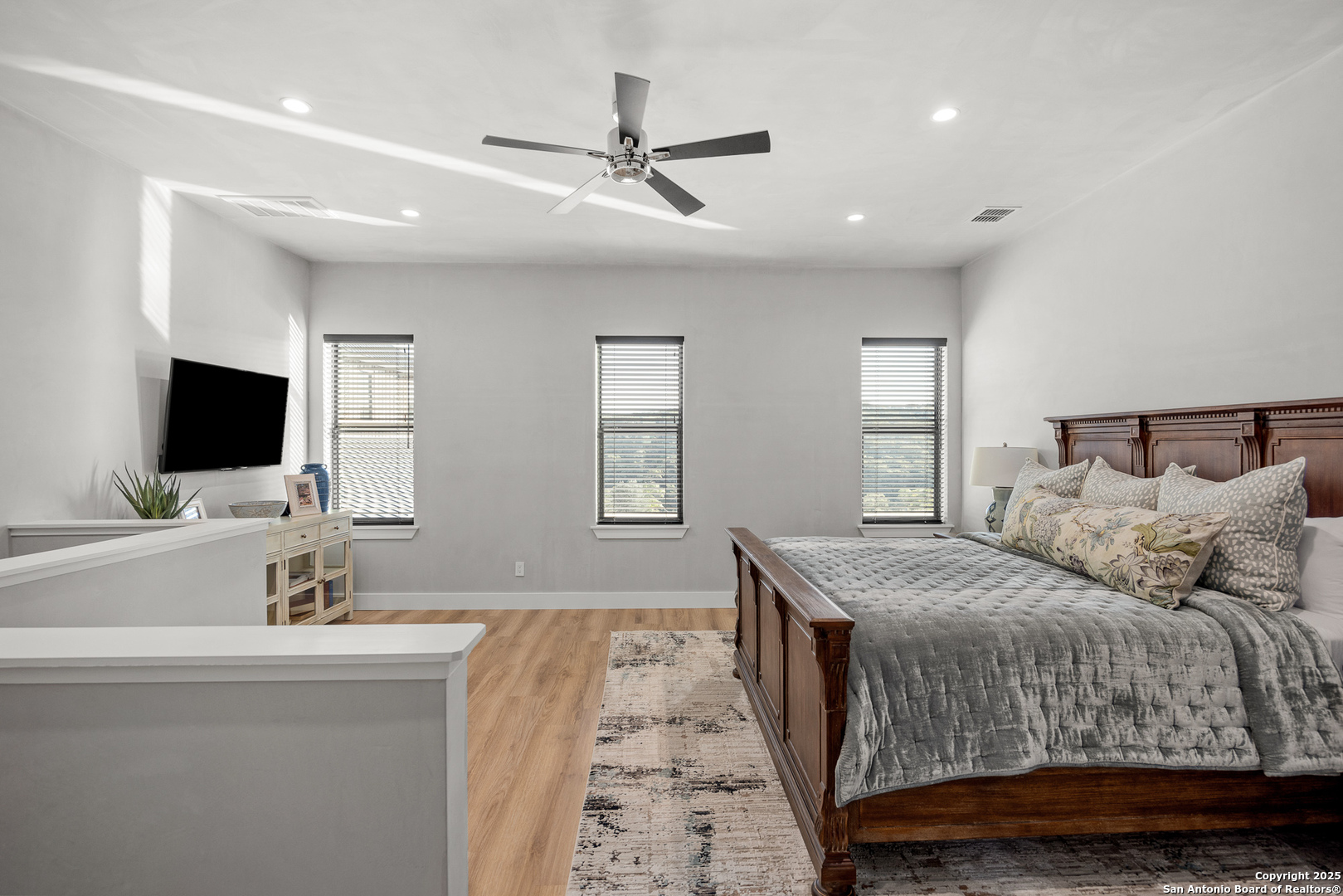 3288 Highway 39 Hunt, TX 78024 - Photo 26 of 50 a bedroom with a large bed and a flat screen tv