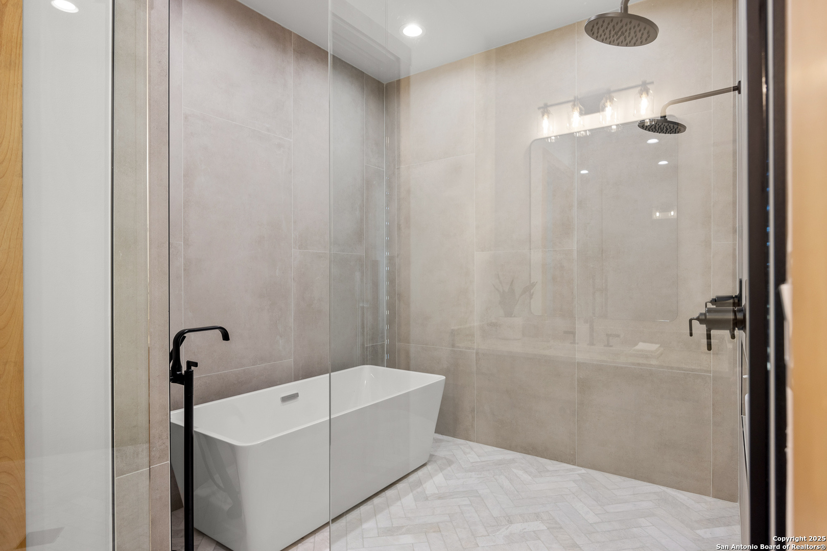 3288 Highway 39 Hunt, TX 78024 - Photo 28 of 50 a bathroom with a bathtub a shower and a sink