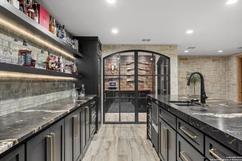 an aerial view of a house with swimming pool