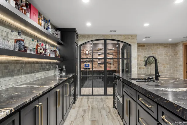 an aerial view of a house with swimming pool