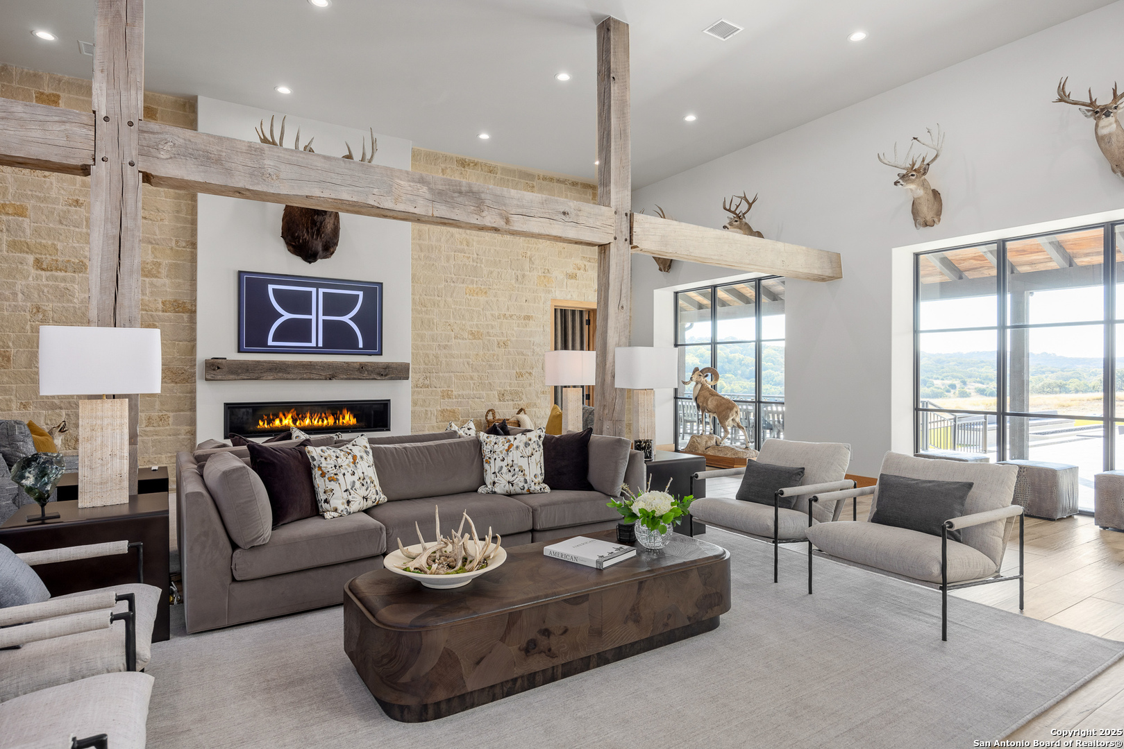 3288 Highway 39 Hunt, TX 78024 - Photo 47 of 50 a living room with furniture fireplace and a large window