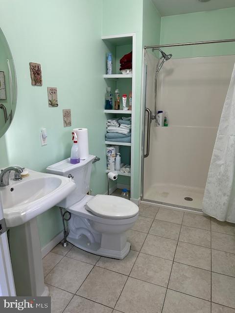 239 Kathmere Road Havertown, PA 19083 - Photo 7 of 11 a bathroom with a sink toilet and shower