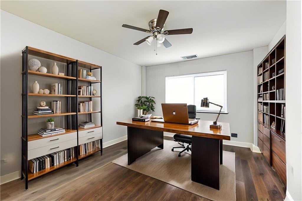 1501 Clairmont Road, Unit 1525 Decatur, GA 30033 - Photo 13 of 26 a view of a workspace with furniture and a bookshelf
