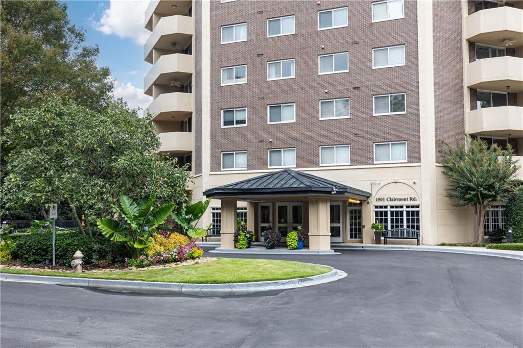 1501 Clairmont Road, Unit 1525 Decatur, GA 30033 - Photo 23 of 26 a front view of a building with a garden