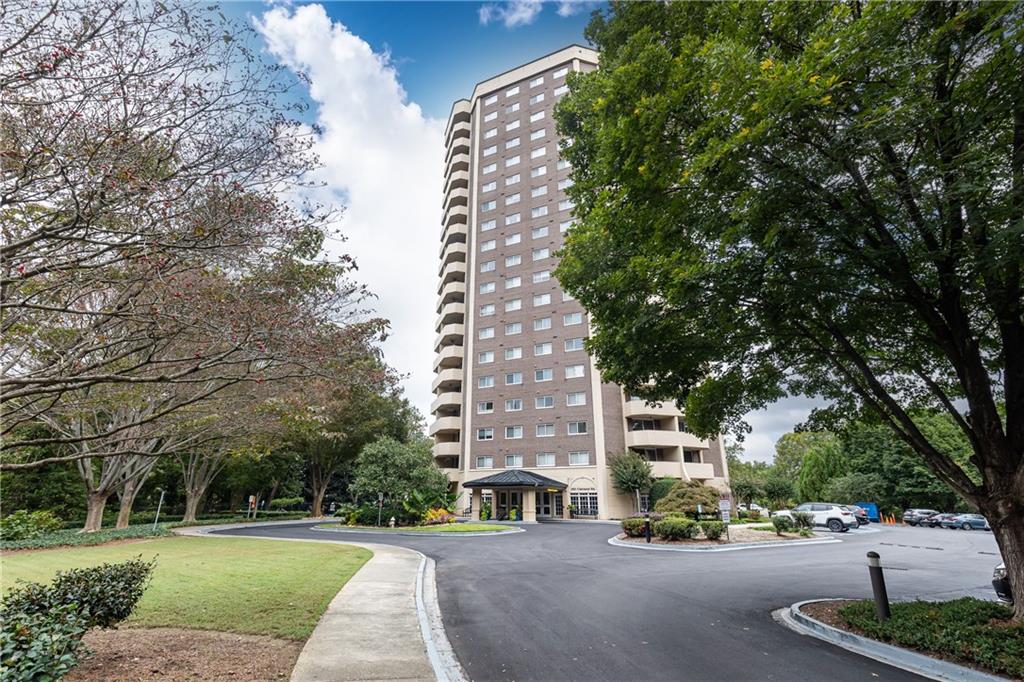 1501 Clairmont Road, Unit 1525 Decatur, GA 30033 - Photo 26 of 26 a building with trees in front of it