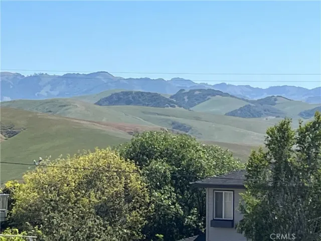 a view of lake with mountain