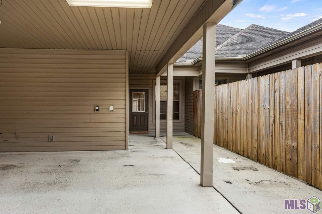 809 Summer Breeze Drive, Unit 1202 Baton Rouge, LA 70810 - Photo 18 of 22 Patio & Garage Area