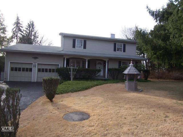 32 Whisconier Road Brookfield, CT 06804 - Photo 1 of 1 a view of a house with a yard and large tree