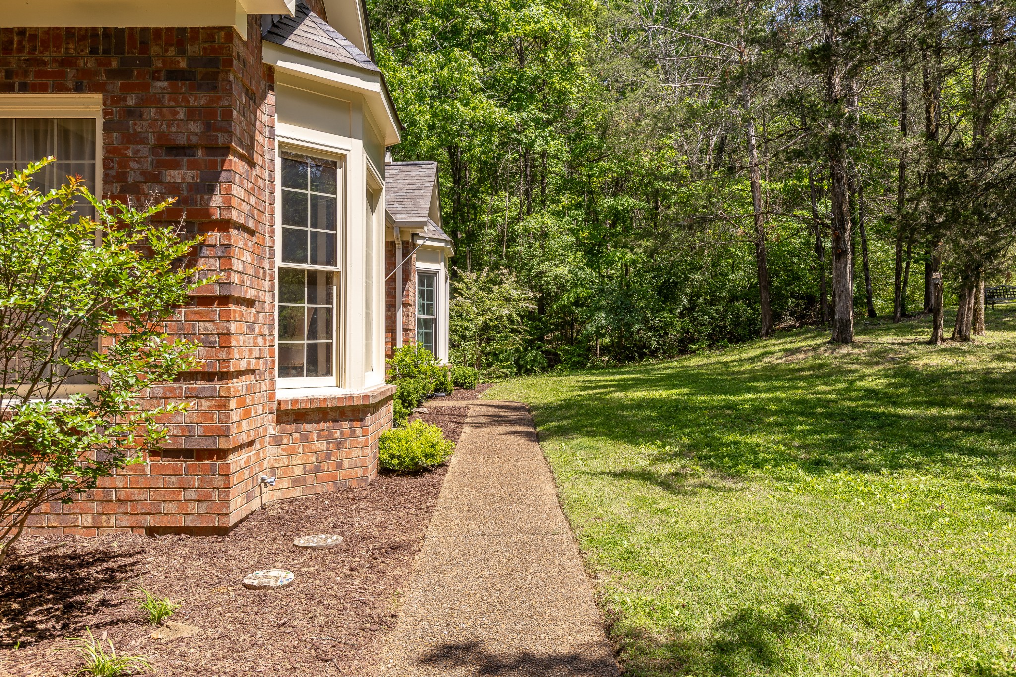 1111 Temple Ridge Court Nashville, TN 37221 - Photo 6 of 46 a view of a house with backyard and garden