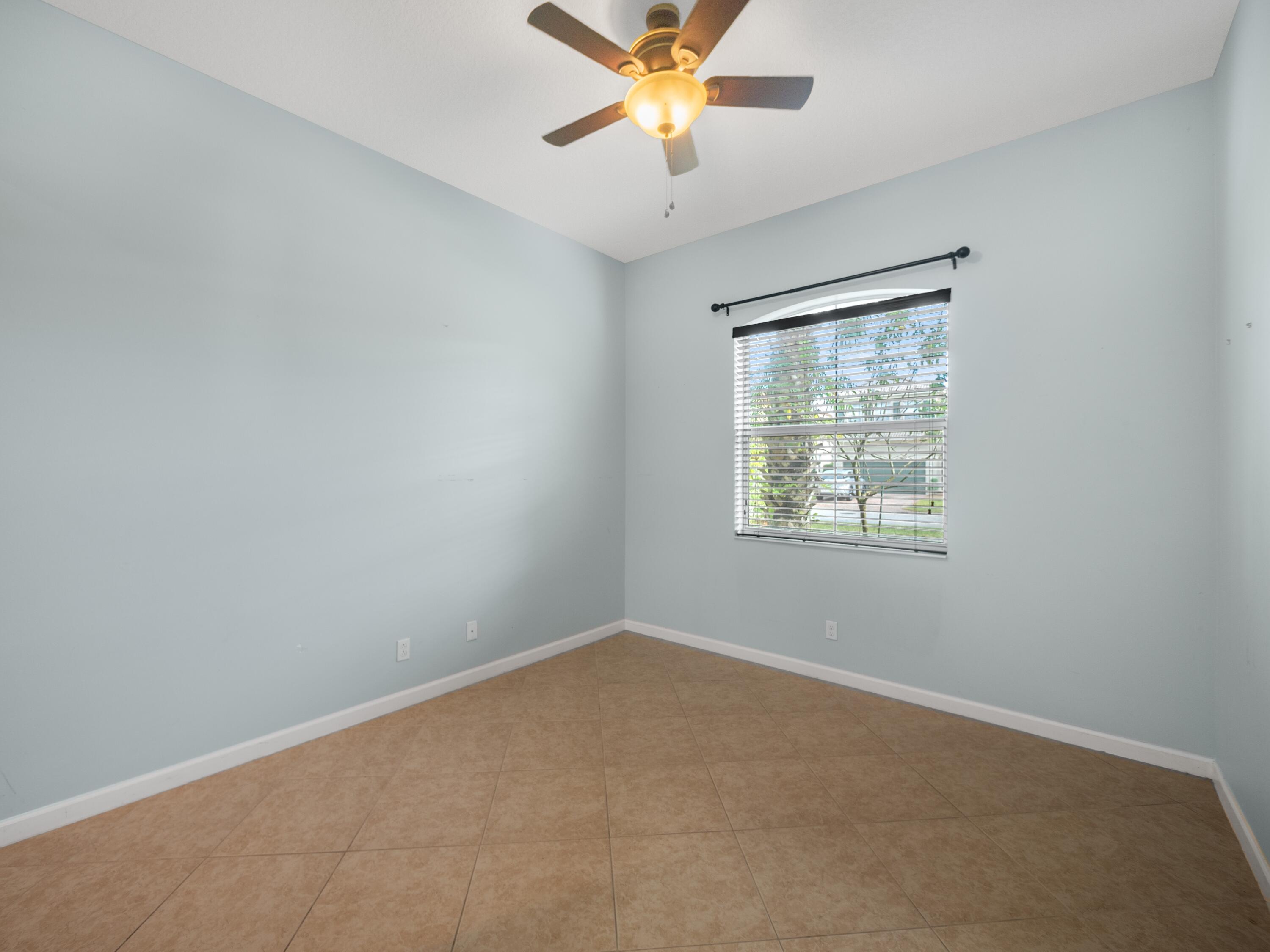 11423 Southwest Fieldstone Way Port St. Lucie, FL 34987 - Photo 14 of 31 dowbstairs ensuite