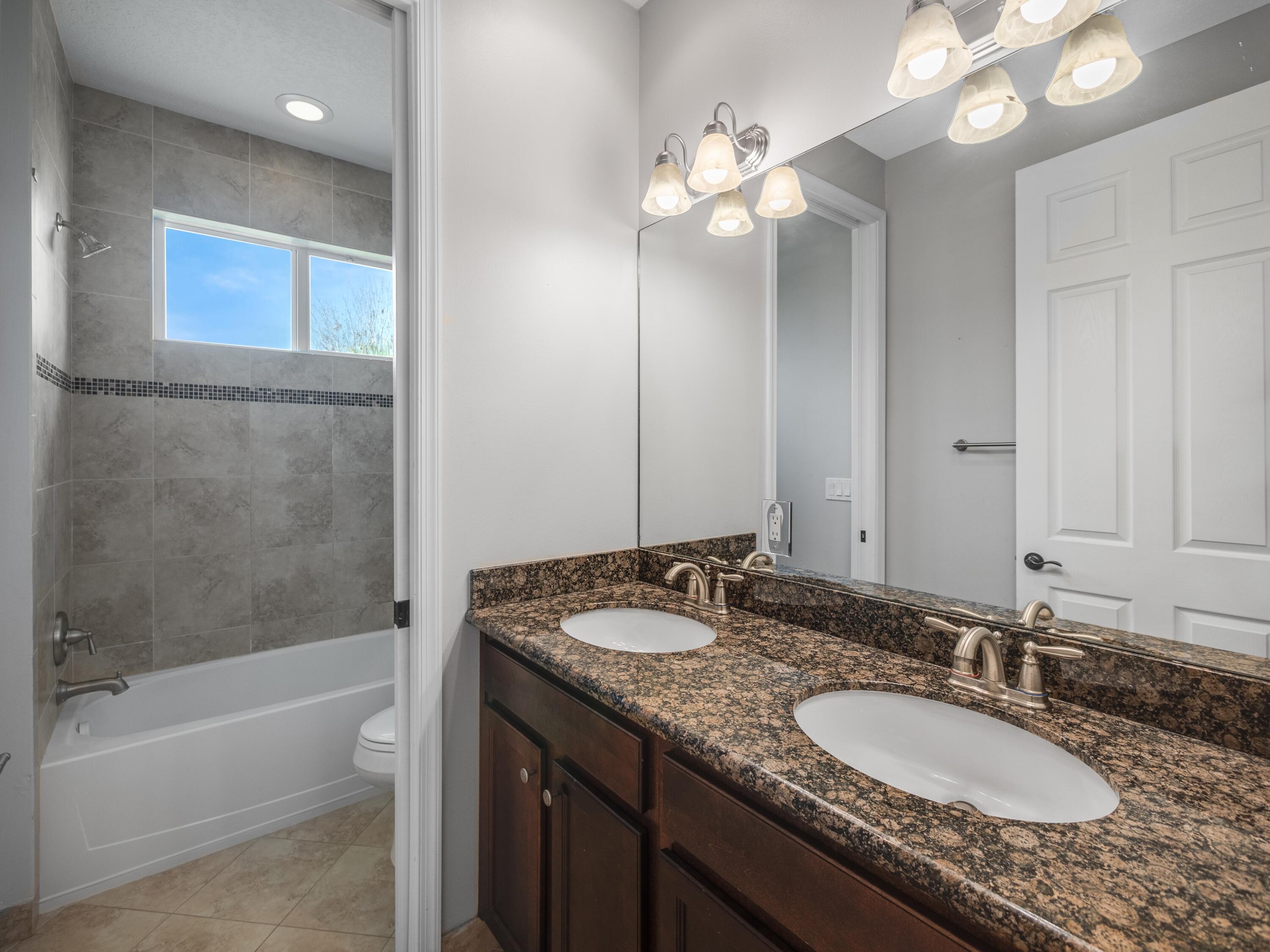 11423 Southwest Fieldstone Way Port St. Lucie, FL 34987 - Photo 22 of 31 4/5th bathroom