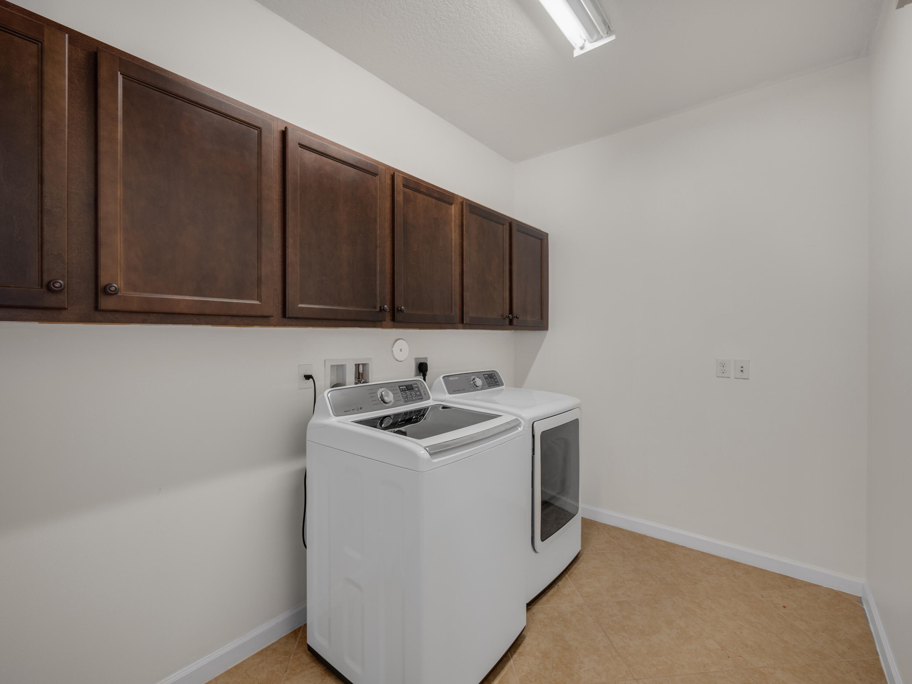 11423 Southwest Fieldstone Way Port St. Lucie, FL 34987 - Photo 24 of 31 laundry second floor