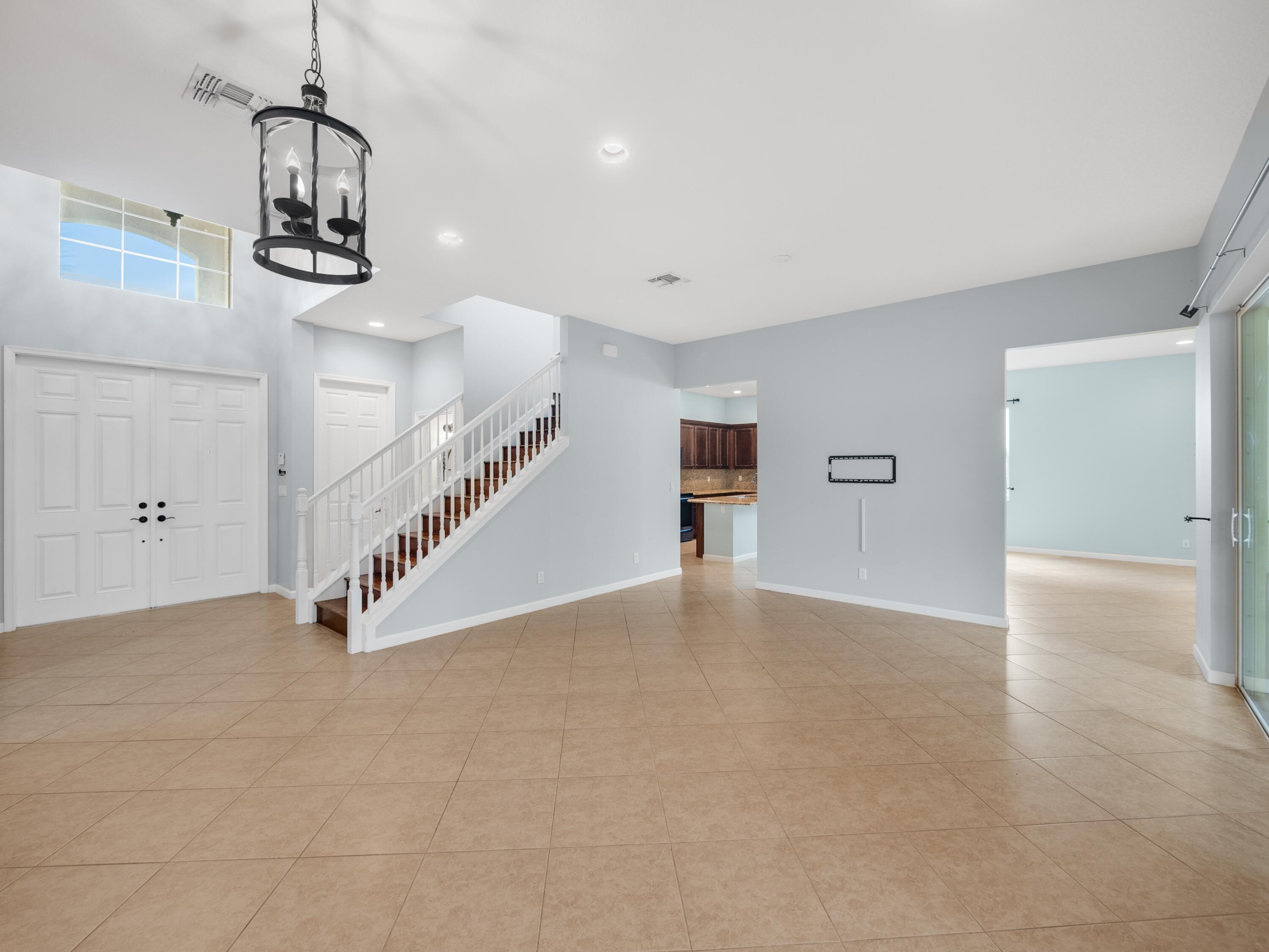 11423 Southwest Fieldstone Way Port St. Lucie, FL 34987 - Photo 3 of 31 family room entrance