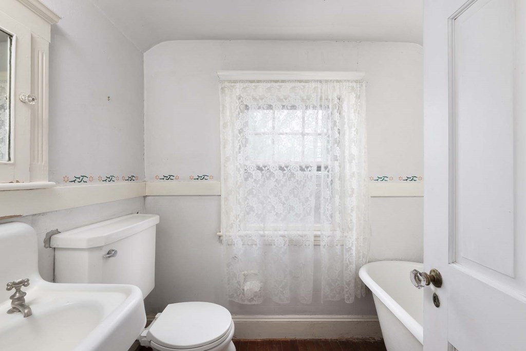 37 Wolcott Road Brookline, MA 02467 - Photo 11 of 12 a bathroom with a sink and bathtub with toilet