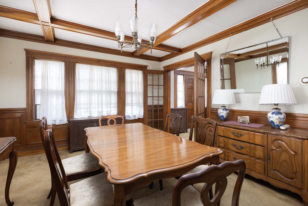 37 Wolcott Road Brookline, MA 02467 - Photo 6 of 12 a view of a dining room with furniture window and outside view