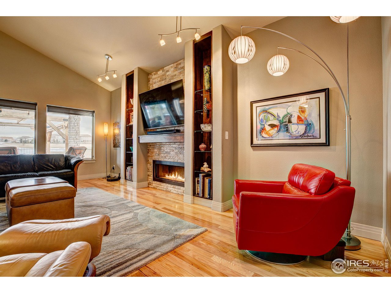 6001 Bay Meadows Drive Windsor, CO 80550 - Photo 15 of 39 Open Great Room with Large Windows to Take In the Views!