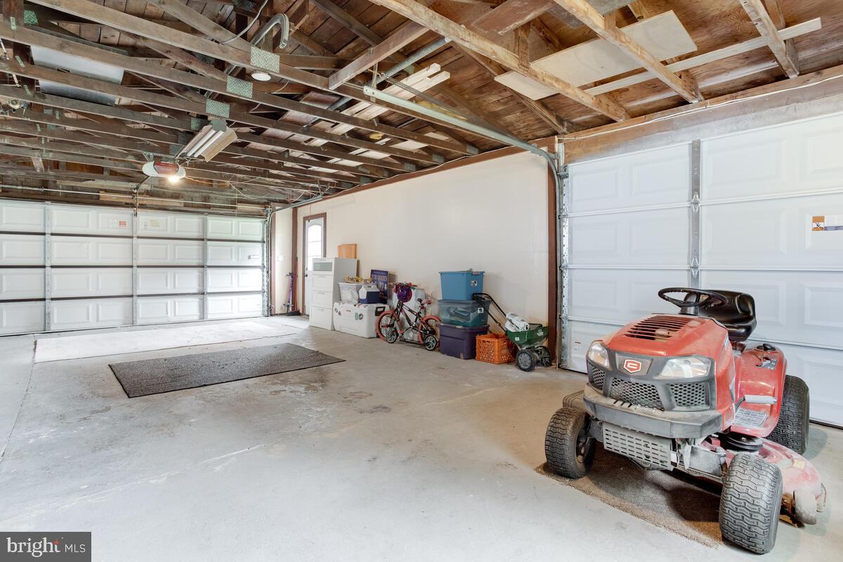8421 Garland Road Pasadena, MD 21122 - Photo 46 of 48 perfect garage for cars and workshop area!
