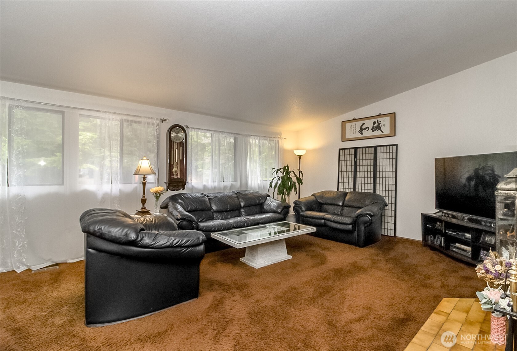 22121 4th Avenue Southeast Bothell, WA 98021 - Photo 10 of 22 a living room with furniture and a flat screen tv