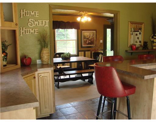 1943 Mars Hill Road Irwin, PA 15642 - Photo 3 of 18 Kitchen. Kitchen opens to dining=perfect for entertaining or family dinners! The wall hanging says it all...it truly is.."Home Sweet Home"!