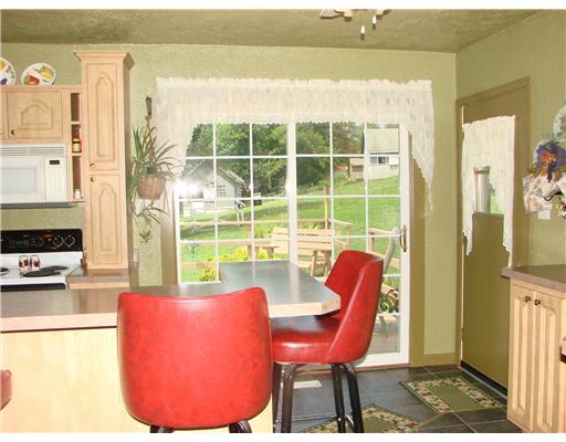 1943 Mars Hill Road Irwin, PA 15642 - Photo 4 of 18 Kitchen. A breakfast bar for casual meals, and check out the patio doors that lead to the "huge" deck!