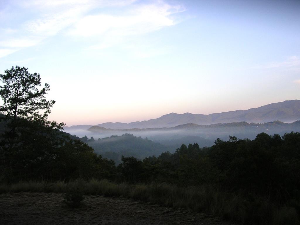 247 Rice Lane Marble, NC 28905 - Photo 10 of 12 a view of mountain with sunset in background