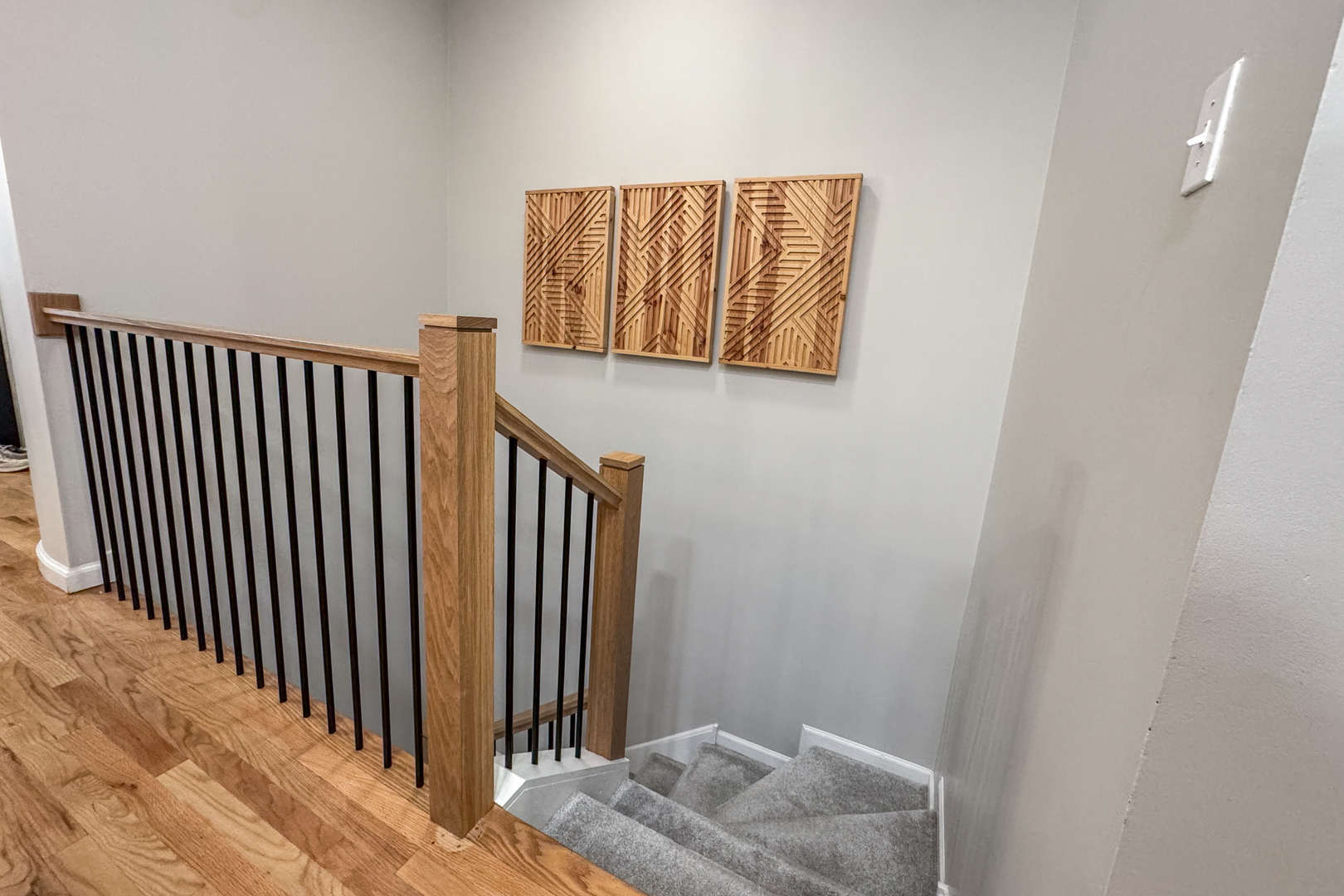 2106 West Erie Street, Unit 1E Chicago, IL 60612 - Photo 21 of 41 a view of a hallway with wooden floor and stairs
